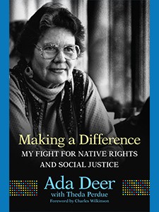 Black and white colored book cover of Ada Deer wearing eyeglasses and turtleneck. There is yellow, white and blue lettering atop the covering.
