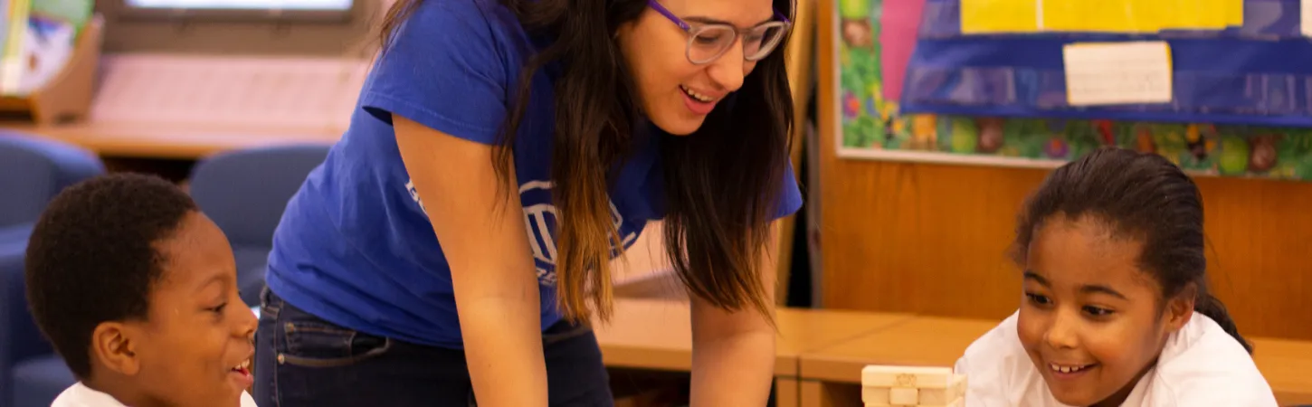 MSW student at practicum placement in school working with kids.